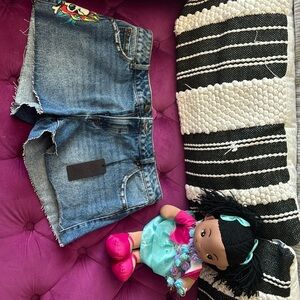 Ed Hardy denim shorts.